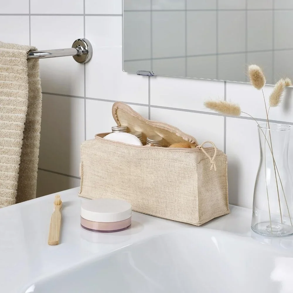 BOLLÖSUND Toiletry bag, beige. 9 